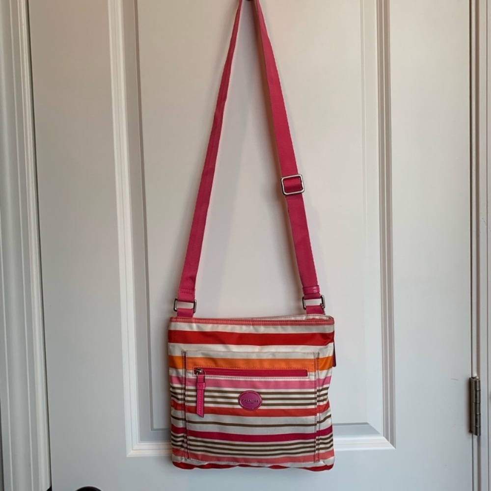 Pink, white, and orange Coach Crossbody Bag.